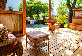 Beautiful outdoor living space with a new deck and pergola in Walnut Park, designed by Drywall Repair & Remodeling Huntington Park.