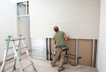 Drywall Repair & Remodeling Huntington Park team working on a living room remodeling project.